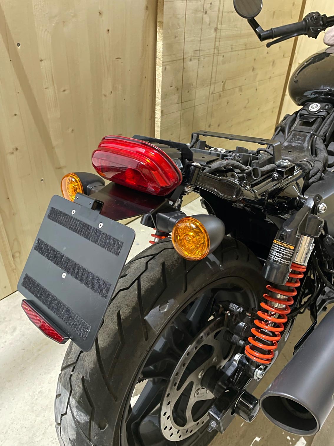 Harley Davidson Street Rod - Fender Eliminator Kit - customer photo - central license plate holder for original turn signals